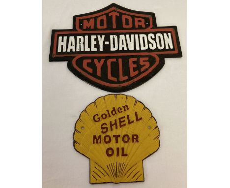 2 painted cast metal wall hanging signs; Harley Davidson together with Shell motor oil.  Largest approx. 26cm x 33cm.