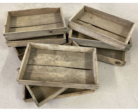 A collection of 9 vintage wooden seed trays.  
