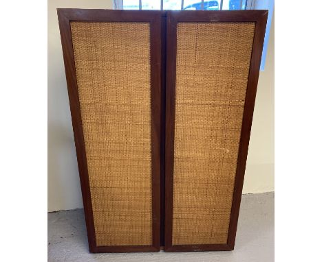 A vintage 2 door cupboard with woven effect door fronts. 2 fixed shelves to interior. Approx. 97cm x 67cm.