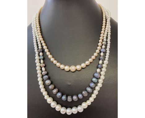 A freshwater and faux pearl necklace with 9ct gold clasp. Together with 2 faux pearl necklaces with silver claps. 