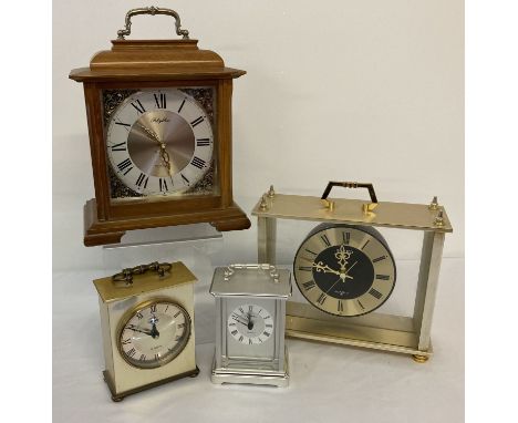 4 vintage wooden and metal cased mantle and carriage clocks. To include Metamec and Seiko.  