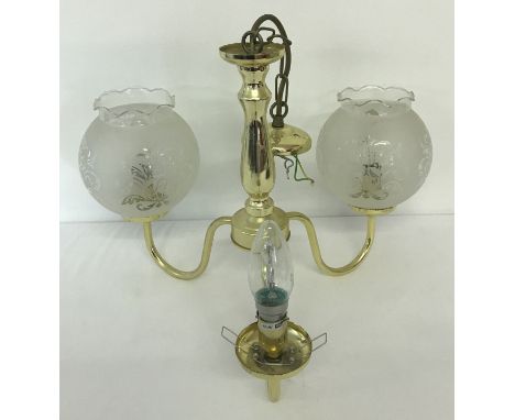 A vintage brass 3 arm ceiling light fitting with etched glass shades. one shade missing. 