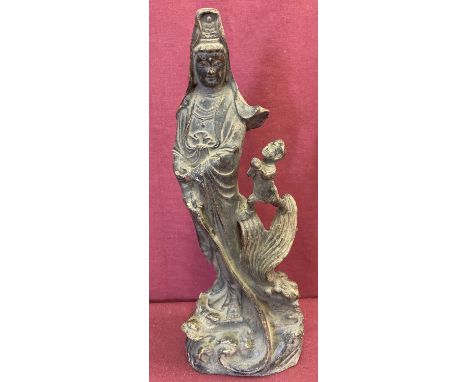 A vintage hollow metal Chinese figurine of an Oriental deity &amp; child riding a dragon. With bronzed detail. Approx. 35.5cm