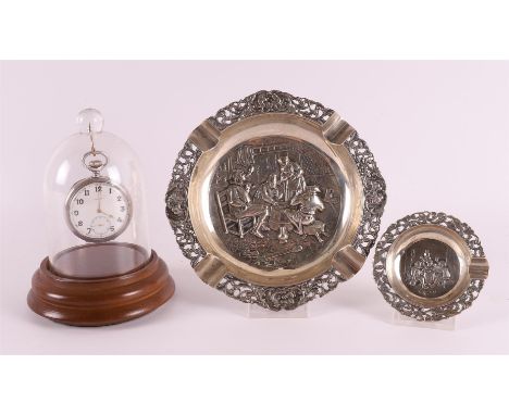 Two second grade 835/1000 silver ashtrays, Holland 20th century, 146 grams. Here is a men's vest pocket watch in a silver cas