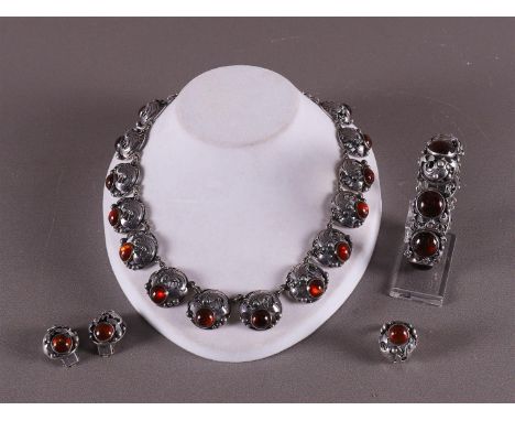 A sterling 925/1000 silver Danish vintage necklace set with cabochon cut amber, Denmark, Skønvirke style, ca. 1950. Design: N