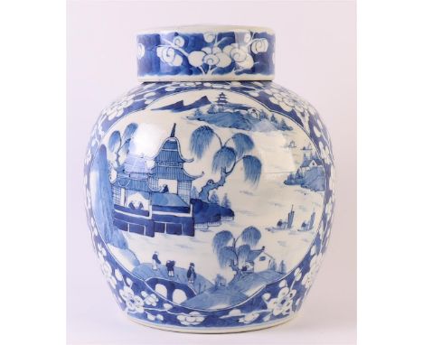 A blue/white porcelain ginger jar with lid, China, 19th century. Blue underglaze decor of a landscape with pagodas and figure