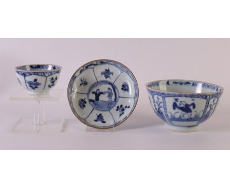 A blue/white porcelain cup and saucer, China, Kangxi, 18th century. Blue underglaze decor of two figures in a garden. Here is
