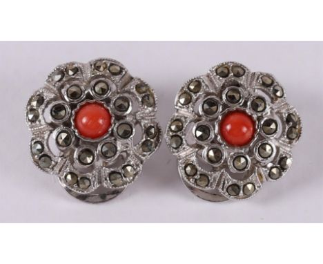 A pair of 3rd grade 800/1000 silver stud earrings with cabochon cut red corals and facet cut hematite.