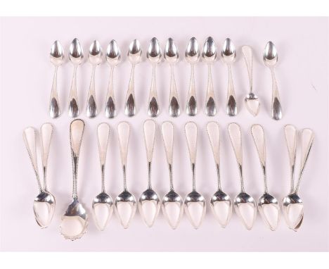 A set of twelve second grade 835/1000 silver teaspoons, mocha spoons and a sugar spoon with a pearl edge decoration, includin