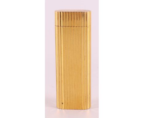 A gold-plated cigarette lighter, marked 'Cartier, Paris 'E 46828', height h 7 x w 2.5 cm.