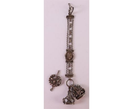 A second grade 835/1000 silver watch chain with keys and cachet, 18th century.