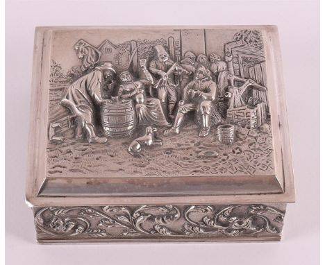 A second grade 835/1000 silver cigarette box with relief Old Dutch decor, year letter 1951. Gross weight 189.5 grams, h 4 x l