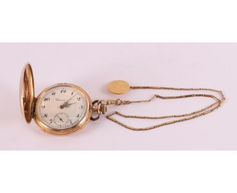 A men's vest pocket watch in 14 kt 585/1000 gold case and ditto gold watch chain with gold five guilders as a button, around 