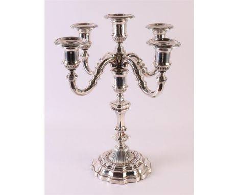 A 3rd grade 800/1000 silver 5-light candlestick with a weighted base. Gross weight 2073 grams, height 38 cm.