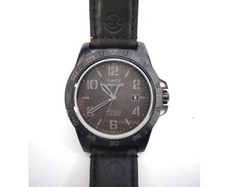 GENTLEMAN'S 'TIMEX EXPEDITION' WRISTWATCHthe black stainless steel case with rotating bezel, the black dial with Arabic numer