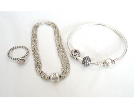 SELECTION OF SILVER PANDORA JEWELLERYcomprising a charm bangle with two charms, a multi strand chain link bracelet, and a gem