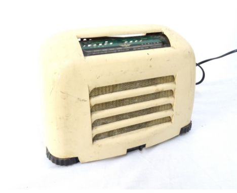 'KOLSTER BRANDES' TRANSISTOR RADIOin a shaped cream Bakelite case with an angled glass tuning panel marked for Long and Mediu