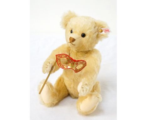 STEIFF MUSICAL TEDDY BEARnamed 'Harrodsbaer 04', the jointed bear with winding musical mechnism and holding a Venetian mask, 