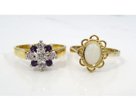 TWO GEM SET SILVER GILT RINGScomprising an amethyst and diamond cluster ring and an opal single stone ring, sizes N and L res