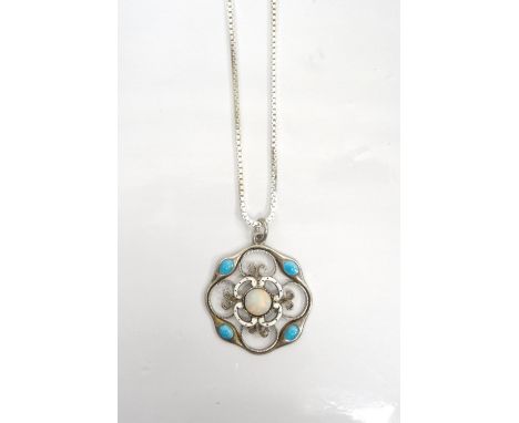 CONTINENTAL OPAL AND TURQUOISE ENAMEL DECORATED SILVER PENDANTwith pierced scroll decoration, on silver chain, the pedant mar