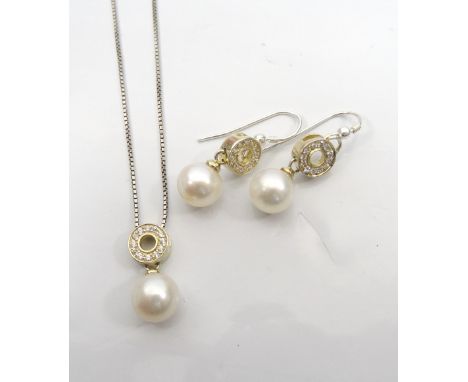 CZ AND PEARL SUITE OF JEWELLERYcomprising a pair of drop earrings and a pendant on chain, the pearl drop on each below a circ