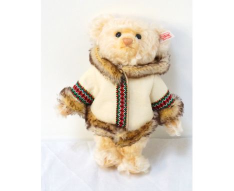 STEIFF ESKIMO TEDDY BEAR dated 2008, with jointed limbs and fur trimmed jacket, limited edition number 588 of 1500, 26cm high