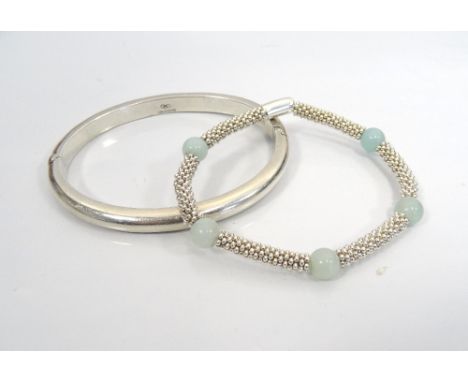 TWO SILVER LINKS OF LONDON BRACELETSone an effervescence star bracelet, the other a plain hinged bangle (2)