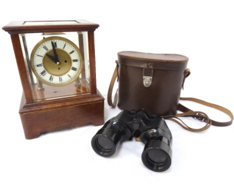 CASED MANTLE CLOCK
the circular dial with Roman numerals, mounted onto a mahogany plinth under a bevelled glass case, now con