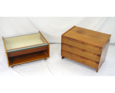 RETRO TEAK LOW CHEST OF DRAWERSwith three flush fitting drawers, 61cm wide; together with a teak occasional table with a lift