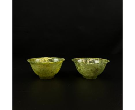 A pair of Chinese spinach jade tea bowls. H.5cm