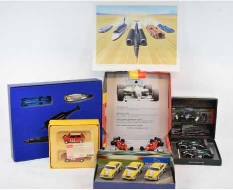 An Onyx Mansell World Champion 1992 commemorative limited edition set of four of his cars, signed by Nigel Mansell, a Lledo L