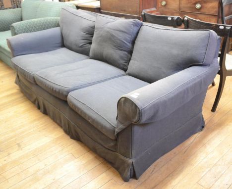 A three seater sofa, with feather filled cushions, 220 cm wide 