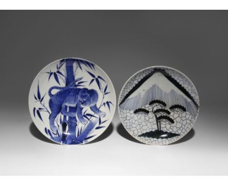 TWO JAPANESE ARITA BLUE AND WHITE DISHES MEIJI PERIOD, 19TH OR 20TH CENTURY Both decorated in underglaze blue; the first depi