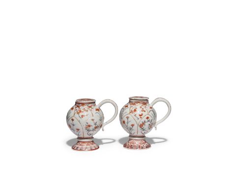 TWO JAPANESE IMARI MUSTARD POTS AND COVERS EDO PERIOD, C.1690-1720 Each with a bulbous body raised on a flared foot and with 