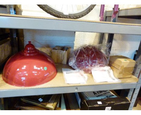 Two red enamel industrial style light shades