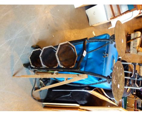 Pair of wrought iron garden stands, a cake stand and an easel