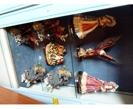 Eight cast iron Daniello collection figures including witches, eagle and hunting scene 