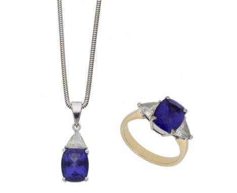 A tanzanite and diamond ring and pendant suite, the ring set with a cushion-shaped tanzanite between two triangular-cut diamo