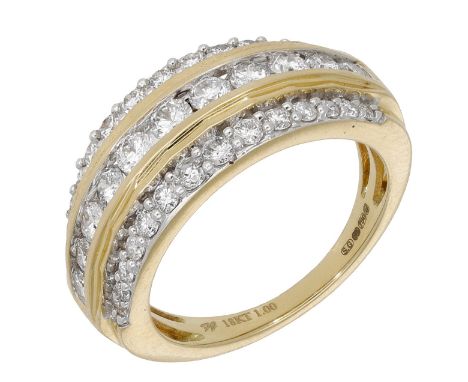 A diamond dress ring, the tapered band set to the front with three rows of graduated brilliant-cut diamonds, mounted in 18ct 