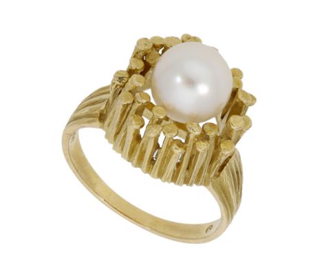 A cultured pearl ring, circa 1970, the cultured pearl, measuring approximately 8.4mm, centred within an abstract surround of 