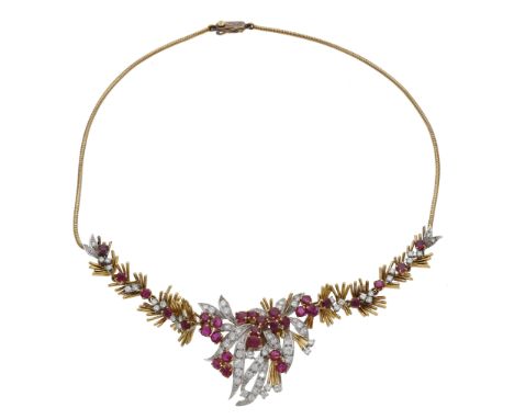 A ruby and diamond necklace / clip combination jewel by Cropp & Farr, 1963, the front formed as a series of staggered spokes 