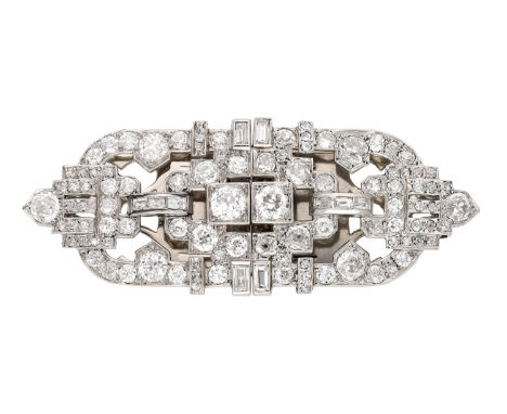 An Art Deco diamond double clip brooch, of openwork geometric design, set throughout with old brilliant, single and baguette-