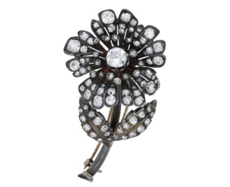 A diamond en tremblant flower brooch, circa 1890, set throughout with old brilliant, cushion and rose-cut diamonds diamonds, 