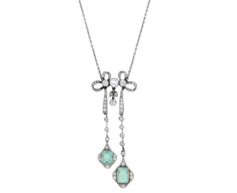 An early 20th century emerald and diamond negligée pendant, set throughout with old brilliant-cut diamonds, the double bow su