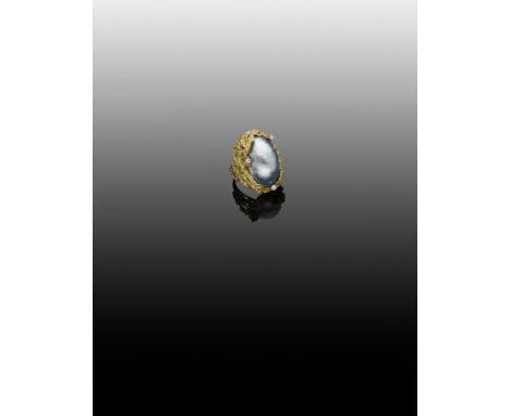 A blister pearl and diamond dress ring by Alan Martin Gard, 1966, the oval blister pearl within an abstract textured mount se