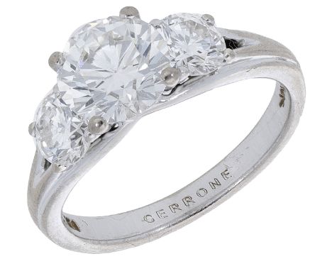 A diamond ring, set with a brilliant-cut diamond, weighing 1.56 carats, with a similarly-cut diamond to either side, between 