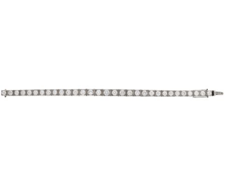 A diamond line bracelet, set with a graduated row of brilliant-cut diamonds, total diamond weight approximately 6.50 carats, 