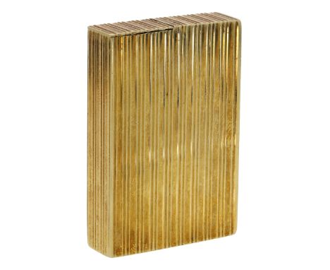 An 18ct gold rectangular pill box by Kurt Weiss, 1973, of reeded form, with hinged lid, the base with London hallmark, maker’