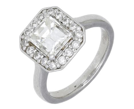A diamond cluster ring, the step-cut diamond, weighing approximately 1.70 carats, within a surround of brilliant-cut diamonds
