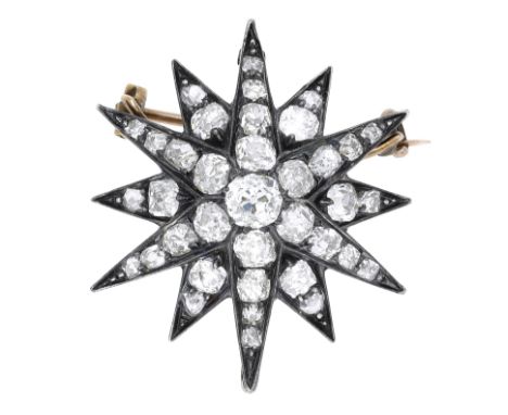 A late 19th century diamond star brooch, the twelve rayed star set throughout with graduated old brilliant and rose-cut diamo